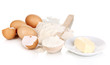 Eggs, flour and butter isolated on white