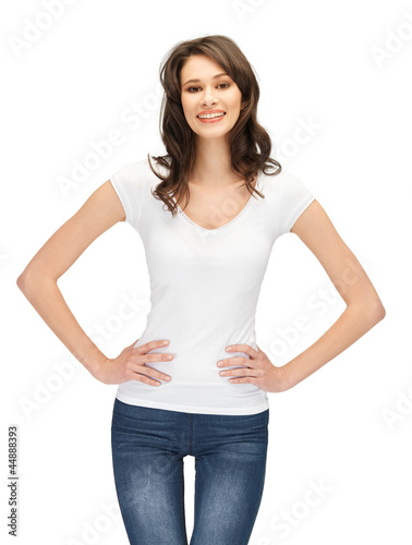 Photo: smiling teenage girl in blank white t-shirt smiling teenage girl in blank white t-shirt