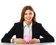 Young beautiful woman sitting with piggy bank (money box)
