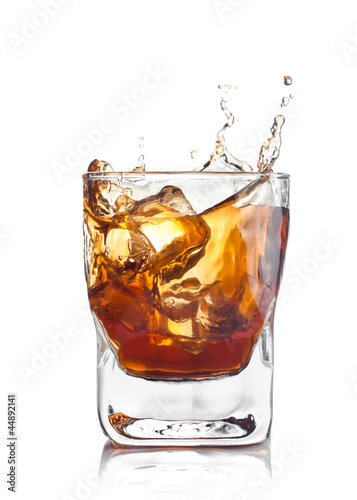 Photo: whiskey splash with ice cubes whiskey splash with ice cubes