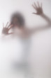 emotional picture of woman standing behind the milk glas