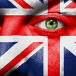 Flag painted on face with green eye to show UK support