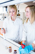 Two female researchers working in a laboratory