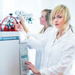 Two female researchers working in a laboratory