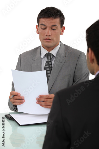 Photo: Man in job interview Man in job interview