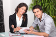 Businesswoman discussing a contract with her client