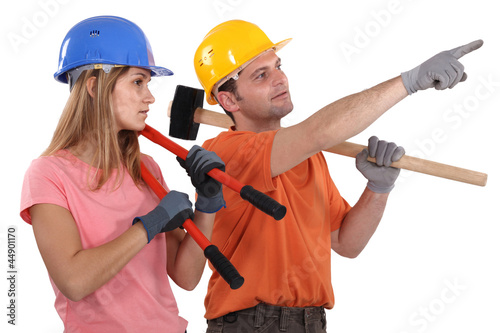 Photo: A team of labourers planning their day's work A team of labourers planning their day's work