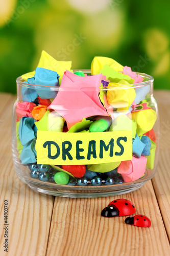 Photo: Glass vase with paper stars with dreams Glass vase with paper stars with dreams