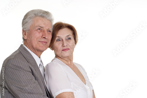 Photo: An elderly man with a woman standing An elderly man with a woman standing