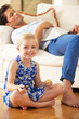 Daughter Painting Sleeping Father's Toenails At Home