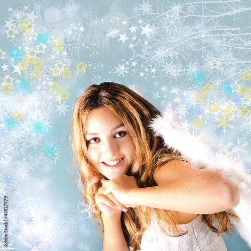 Photo: Merry Christmas: Pretty, smiling angel Merry Christmas: Pretty, smiling angel