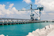 Crane and jetty for loading raw material from tanker ship