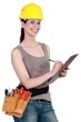 Female surveyor with clip-board and pen