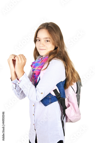 Photo: girl with backpack showing heart by hands over white girl with backpack showing heart by hands over white