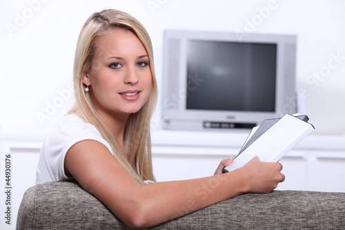 Photo: Blonde woman with boxes of film Blonde woman with boxes of film