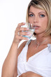 Woman drinking glass of water