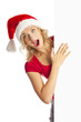 Photo: Sexy woman happy and holding empty banner. Christmas Sexy woman happy and holding empty banner. Christmas