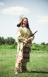 Photo: North American Indian in full dress. Reconstruction North American Indian in full dress. Reconstruction