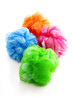 Photo: Four colorful shower scrubbers Four colorful shower scrubbers