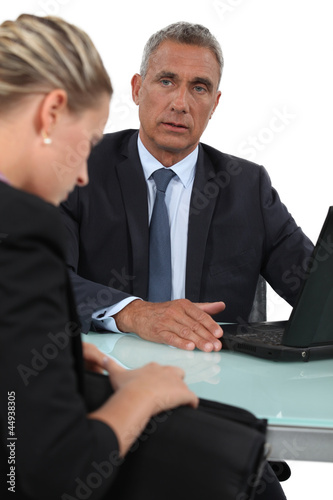 Photo: Businessman staring at an attractive woman Businessman staring at an attractive woman
