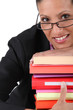 employee holding a stack of files
