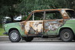 set on fire car, side view