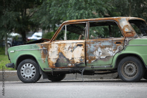 Photo: set on fire car, side view set on fire car, side view