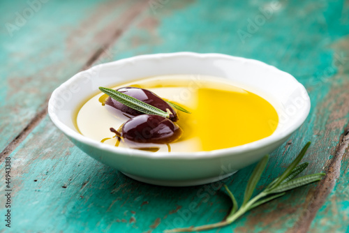 Photo: Kalamata olives in a bowl of olive oil Kalamata olives in a bowl of olive oil