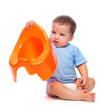 Photo: Little boy holding potty Little boy holding potty