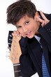 Boy posing with his electric guitar