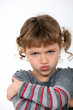 Angry little girl grinning