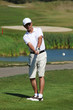 Photo: Man playing golf Man playing golf
