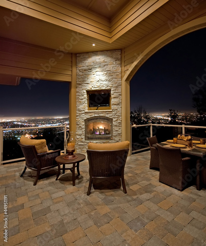 Photo: Beautiful Outdoor Patio at Night with City View Beautiful Outdoor Patio at Night with City View