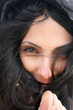 Woman snug in a hood