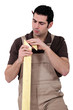 carpenter with lumber