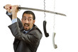 Angry businessman cutting the phone cable