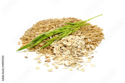 Photo: Whole Oats, Oat Flakes and Ear of Oats Isolated on White Whole Oats, Oat Flakes and Ear of Oats Isolated on White