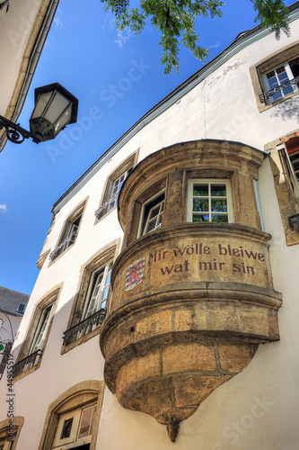 Photo: Luxembourg motto on a bay window at Luxembourg City old town his Luxembourg motto on a bay window at Luxembourg City old town his