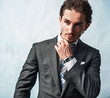 young handsome guy in  stylish suit