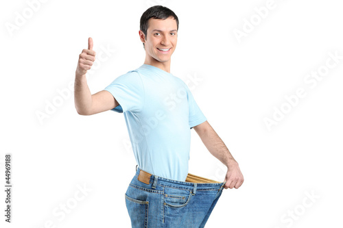 Photo: A weight loss male with thumb up A weight loss male with thumb up