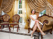 Portrait of a beauty woman in stylish room