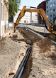 Verlegung von Leerrohr für Kabel beim Strassenbau