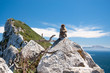 Marmoset in Gibraltar. On the Background, the Morocco Coast