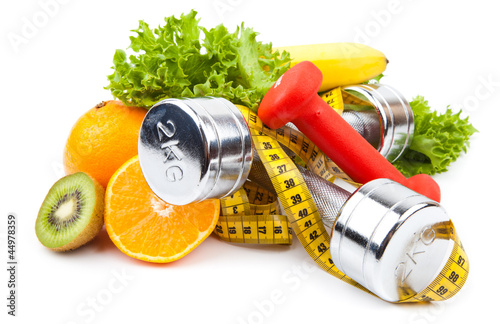Photo: fitness equipment and fruits fitness equipment and fruits