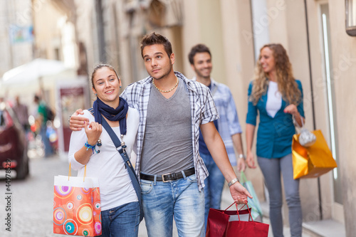 Photo: Group of Friends with Shopping Bags Group of Friends with Shopping Bags