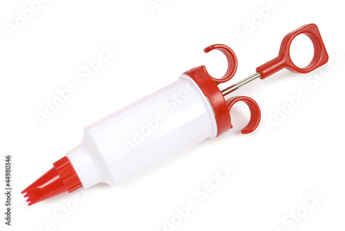Photo: Icing pipe on a white background. Clipping path included. Icing pipe on a white background. Clipping path included.