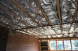 Fibreglass insulation installed in the sloping ceiling of a hous