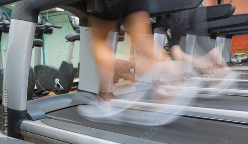 Photo: People jogging on a treadmill People jogging on a treadmill