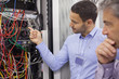 Photo: Technicians fixing wires Technicians fixing wires
