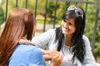 Photo: Mother and daughter talking holding hands teen Mother and daughter talking holding hands teen